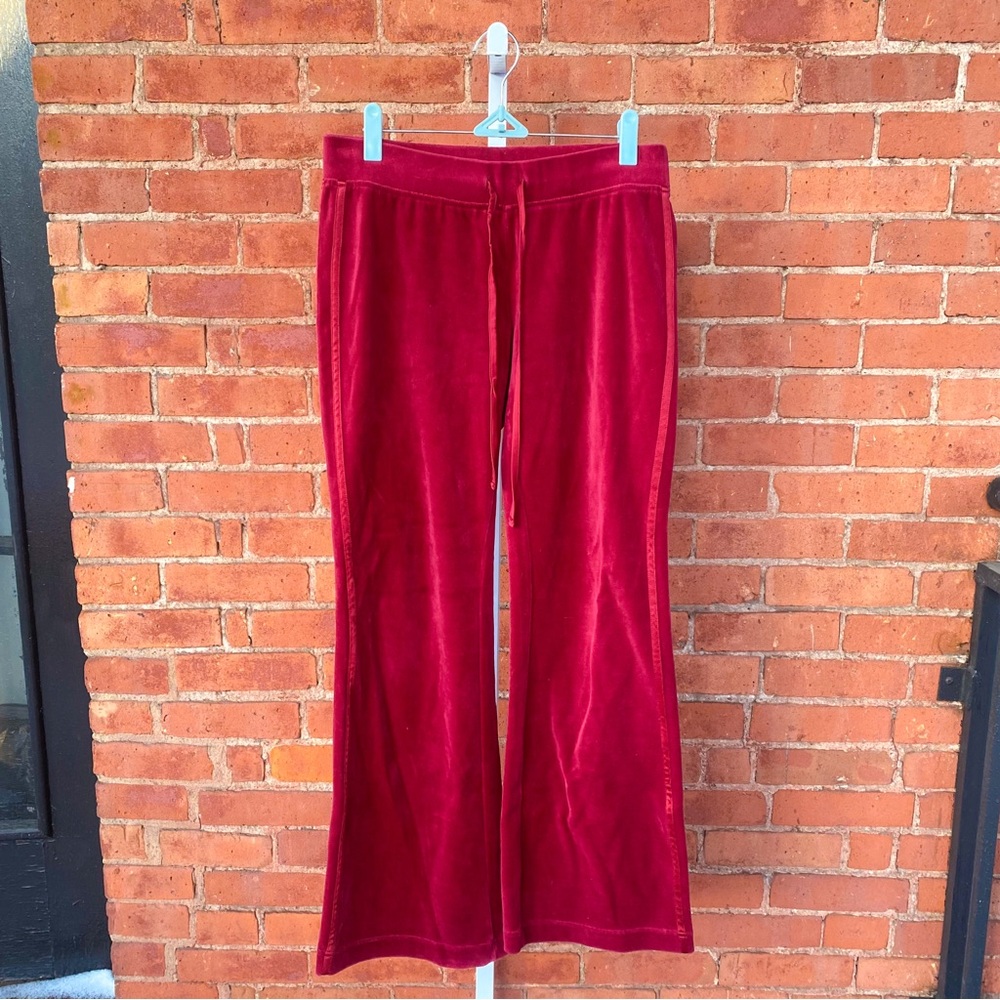 red velour track pants